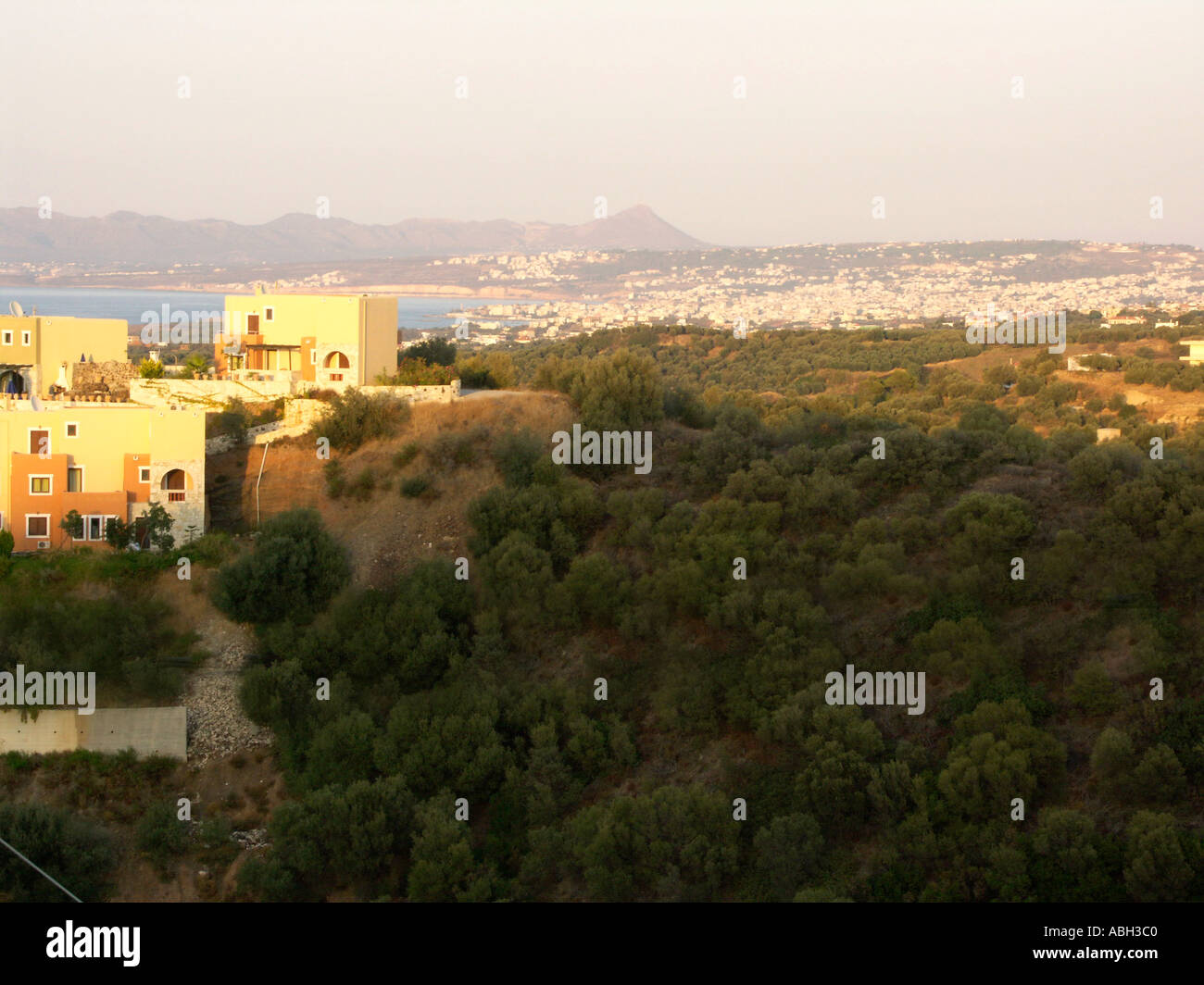 View of Chania in Evening Sunlight from Stalos Foothills Crete Stock Photo