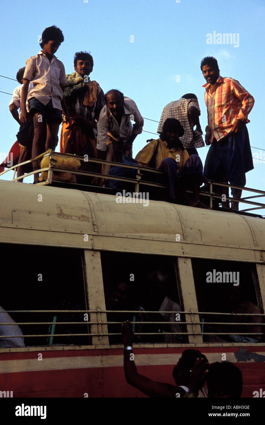 Indian passengers arriving at Kumily bus station having travelled on ...