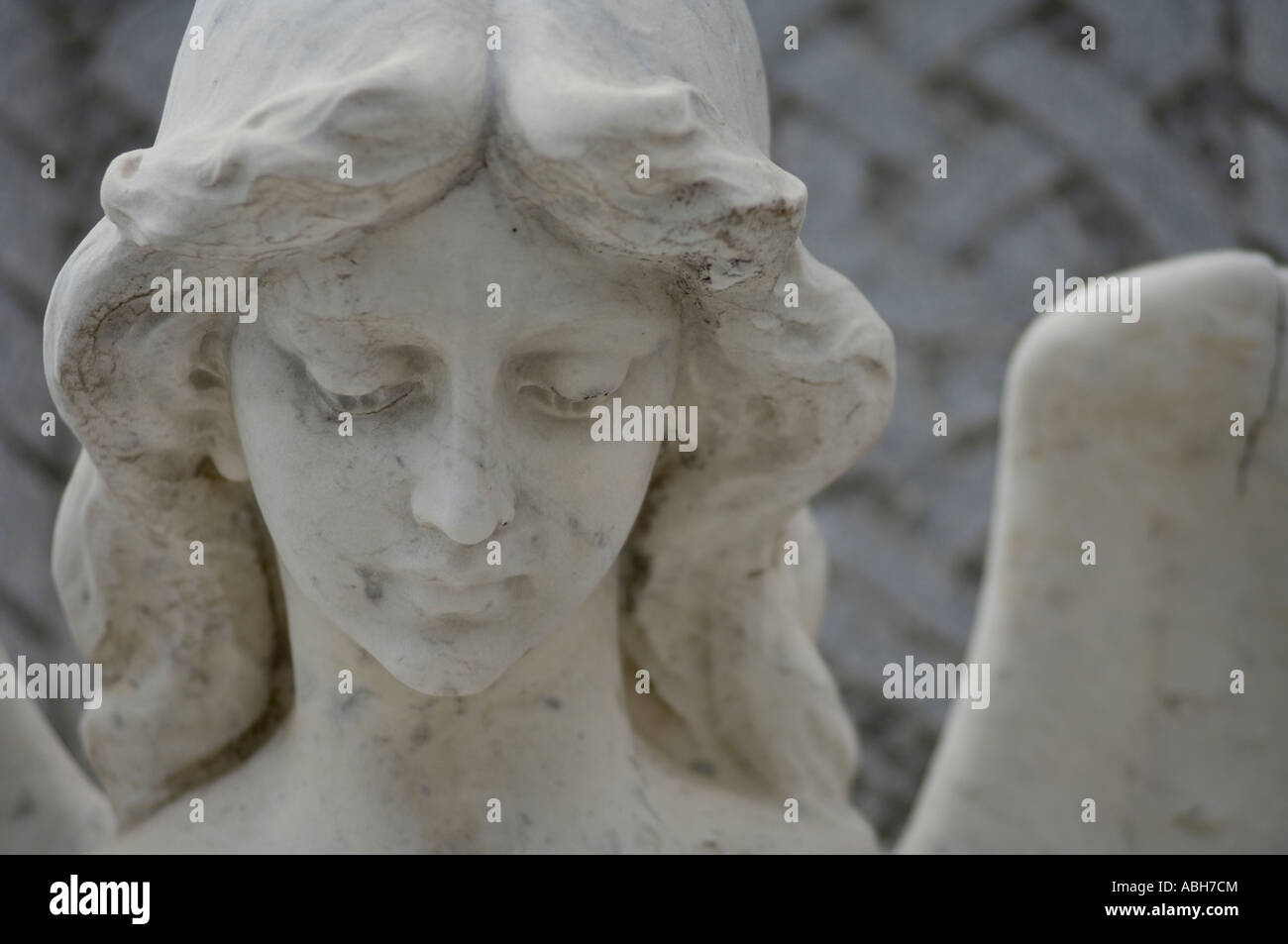 A portrait of a contemplative angel in a cemetery Stock Photo