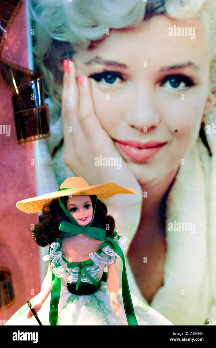 Barbie as Scarlet O'Hara (Green Drapery Dress) Hollywood Legend Collection  doll with Marilyn Monroe portrait background and film reel details Stock  Photo - Alamy