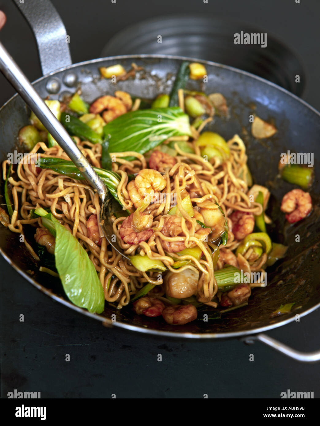 Oriental stirfry of seafood and vegetables with noodles Stock Photo