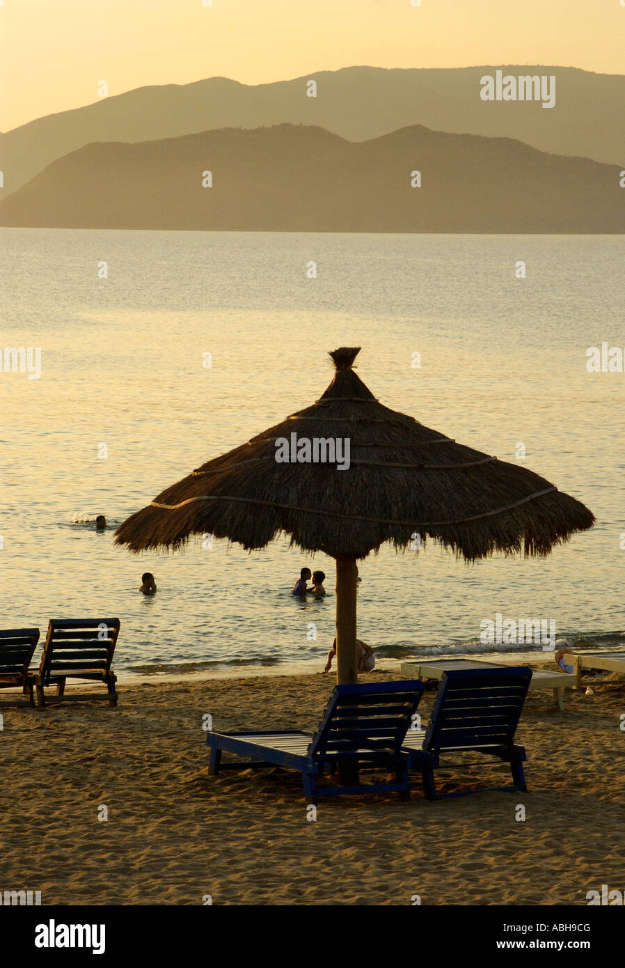People swim at the beach in the early morning Nha Trang Vietnam Stock