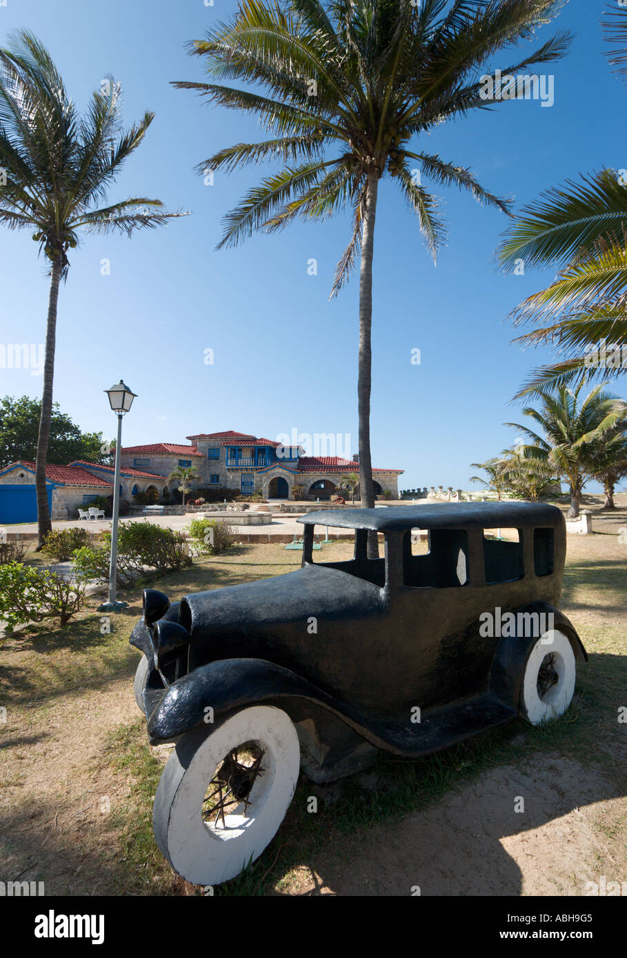 Model of a 1920's car in front of La Casa de Al Restaurant (the former vacation home of Al Capone), Varadero, Cuba Stock Photo