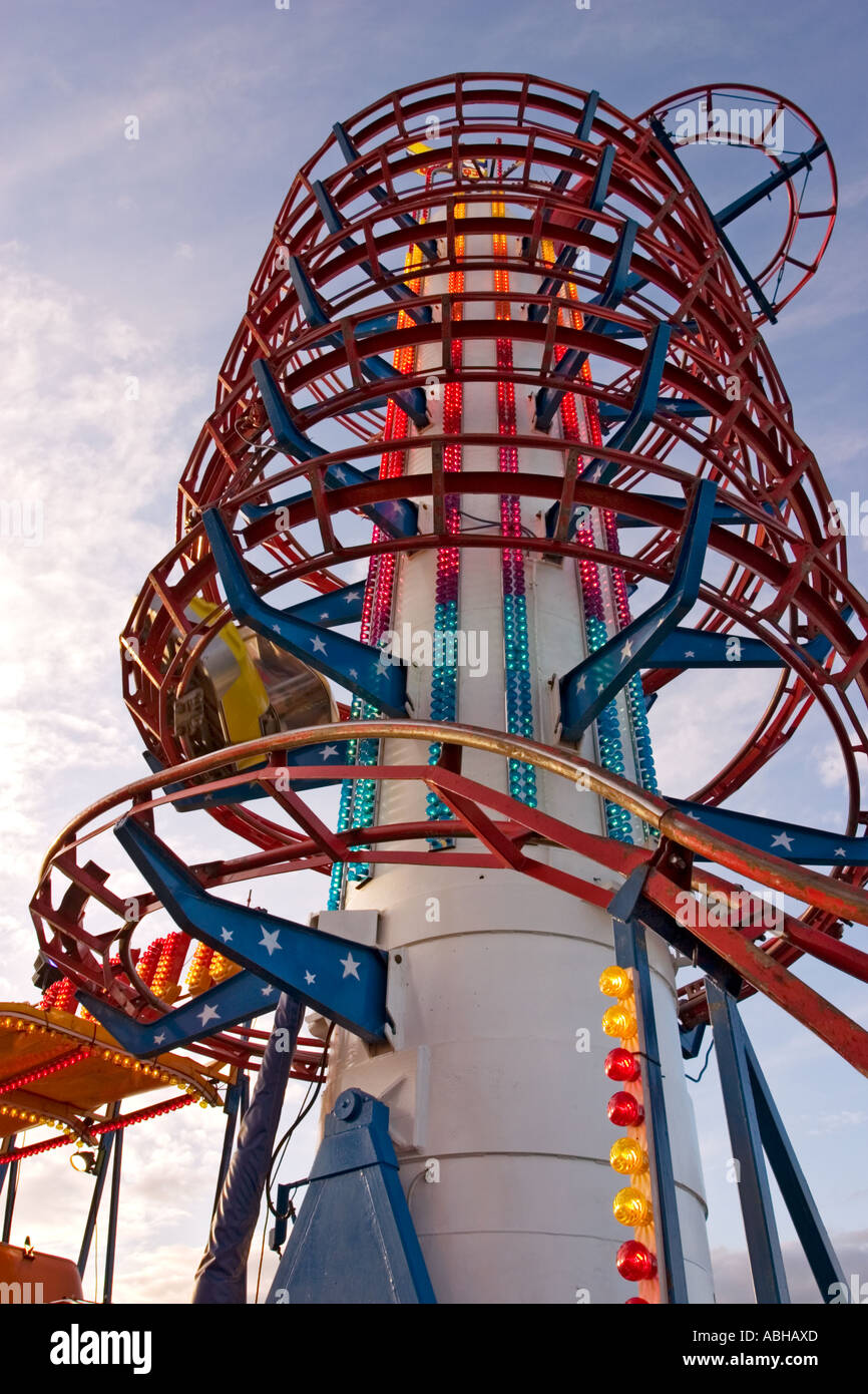 Car on fairground ride flies past Stock Photo - Alamy