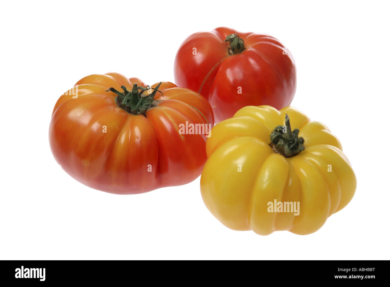 Heirloom tomatoes cut out on white background Stock Photo Alamy