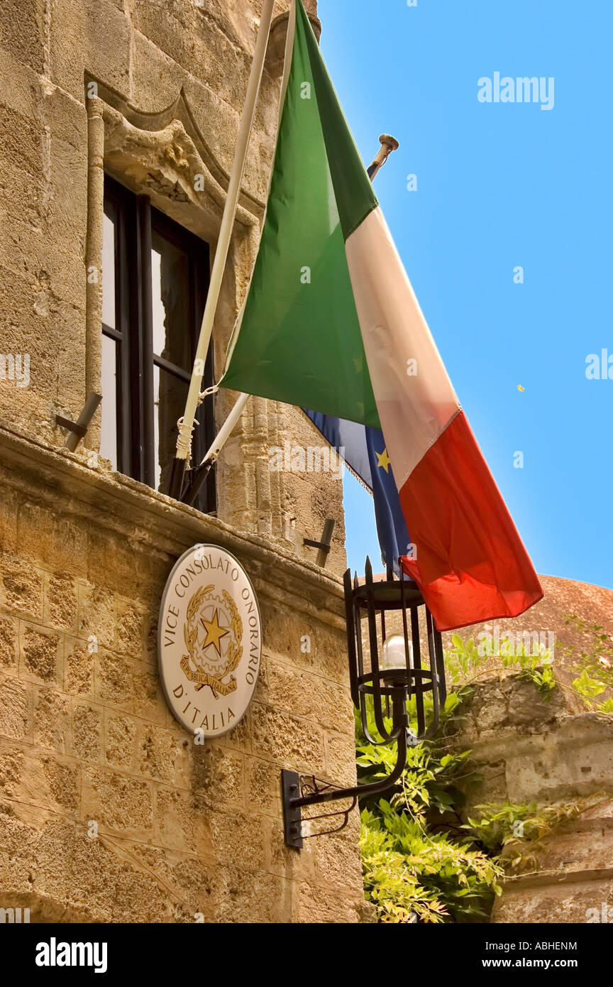 Italy flag and emblem on vice consulate building Stock Photo