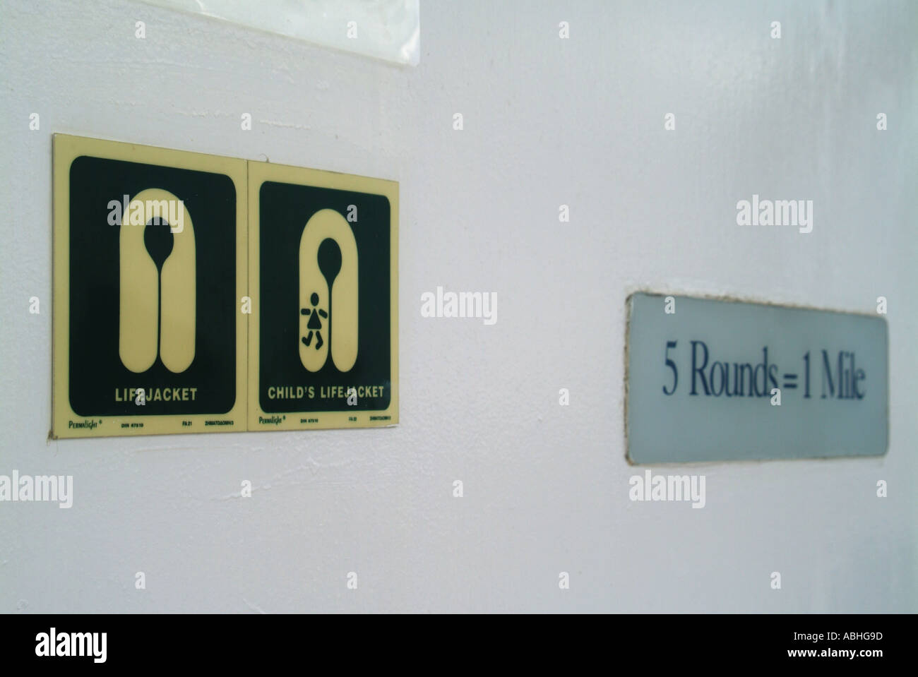 Safety signs on passenger decks cruise ship showing lifejackets marker