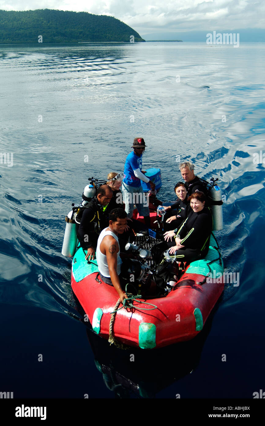 Inflatable boat loaded with divers in Raja Ampat Stock Photo - Alamy