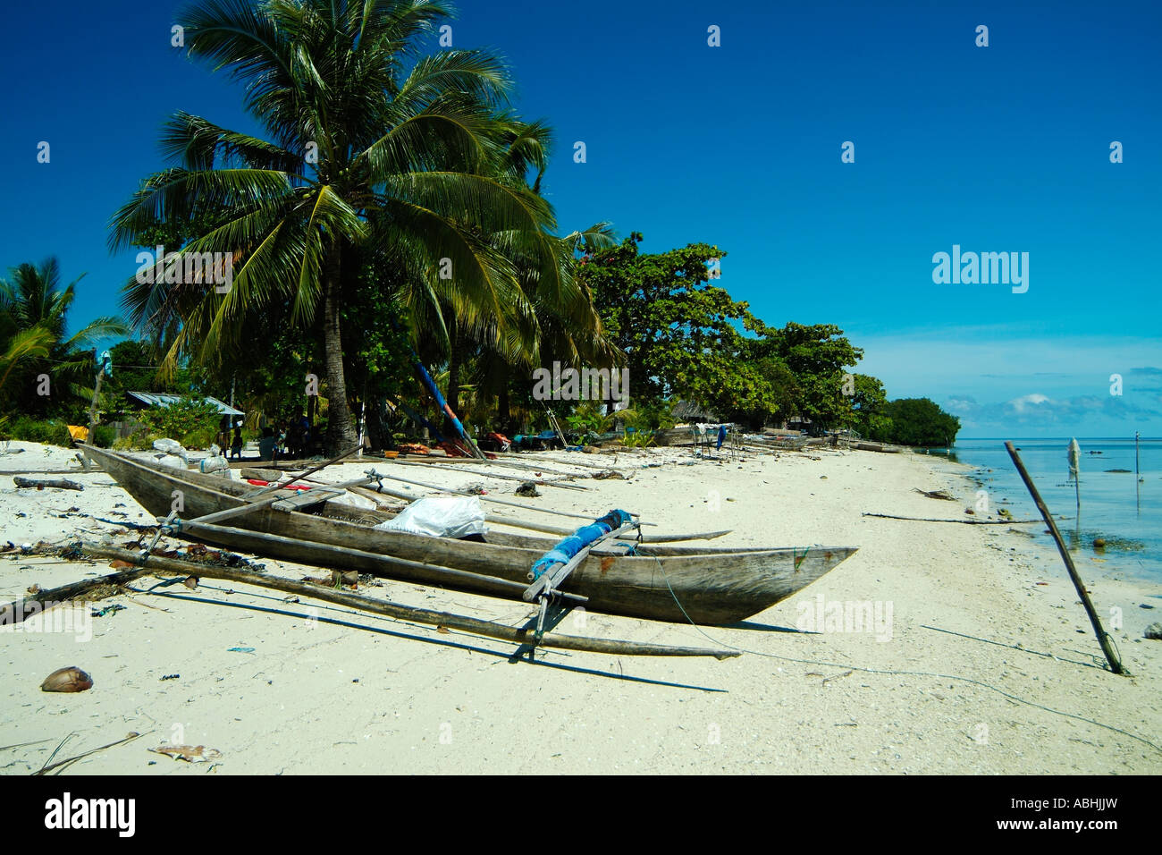 Wooden boat, Small island in Raja Ampat Archipelago, Indonesia Stock Photo