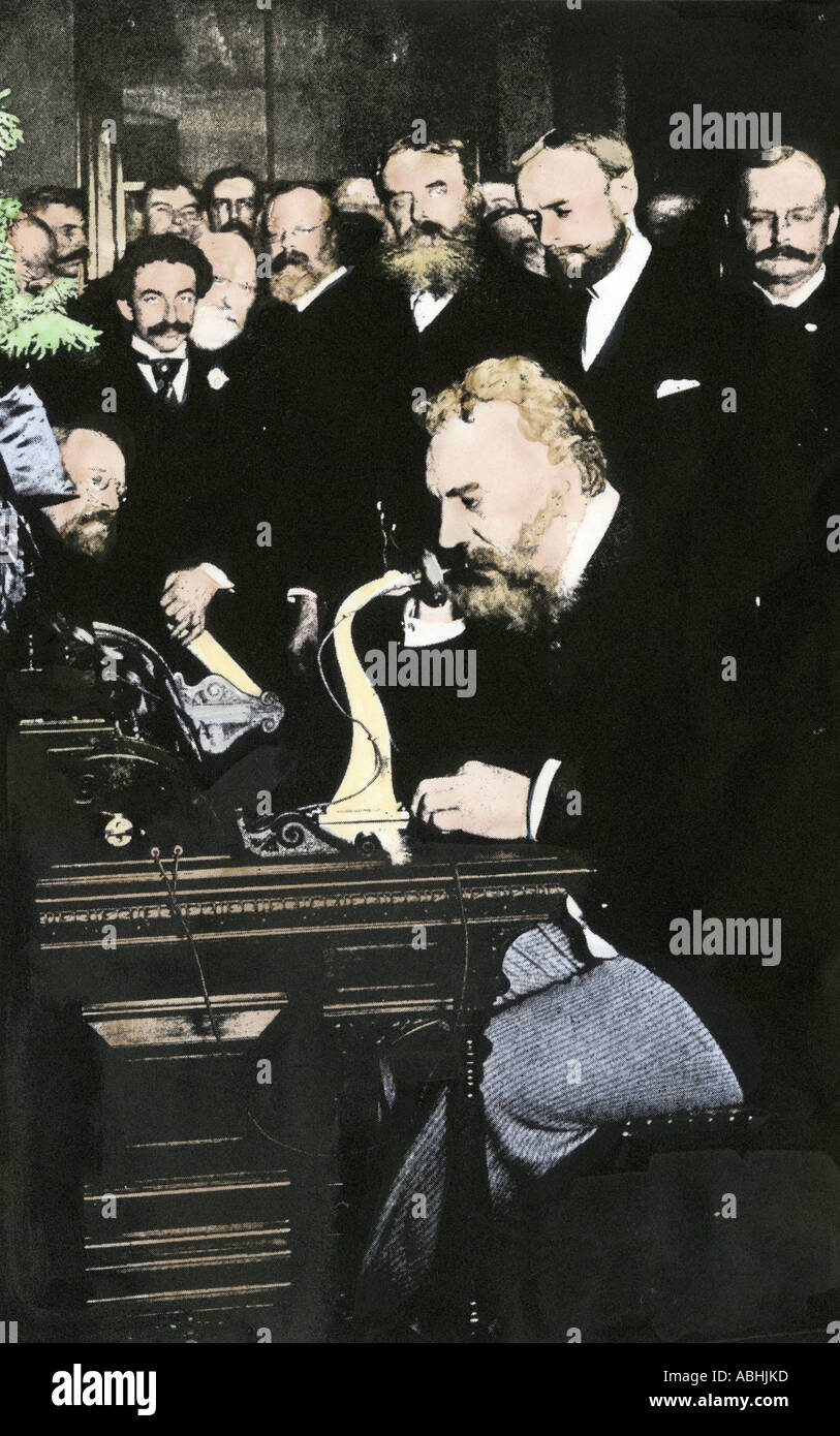 Alexander Graham Bell in New York City communicatiing for the first time with Chicago by telephone. Hand-colored halftone of a photograph Stock Photo