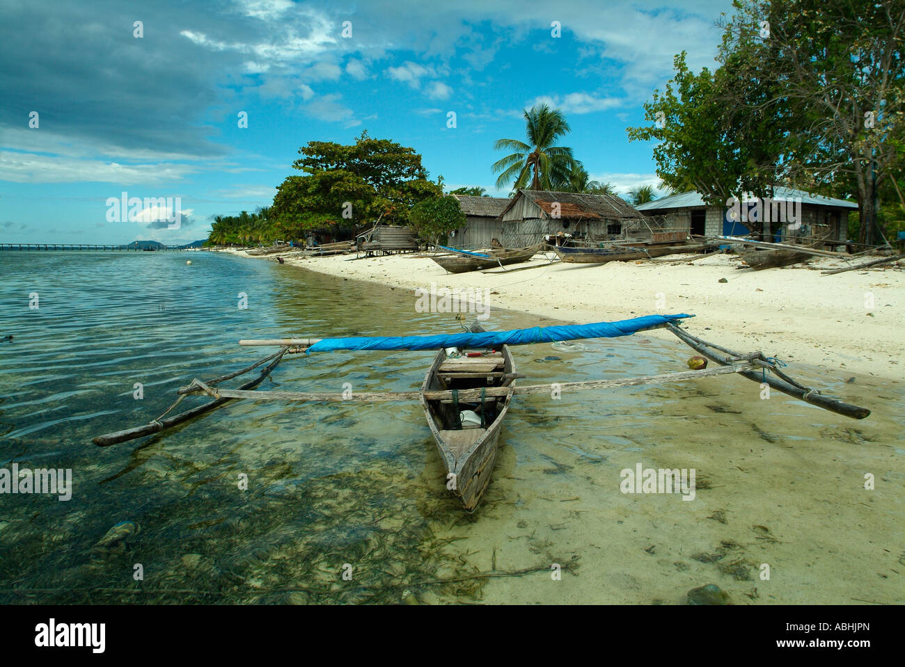 Wooden boat, Small island in Raja Ampat Archipelago, Indonesia Stock Photo