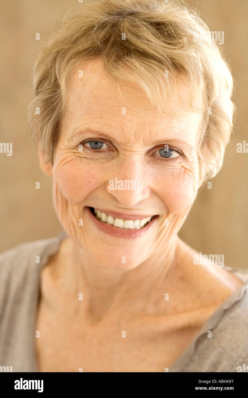 Portrait of smiling senior woman Stock Photo - Alamy