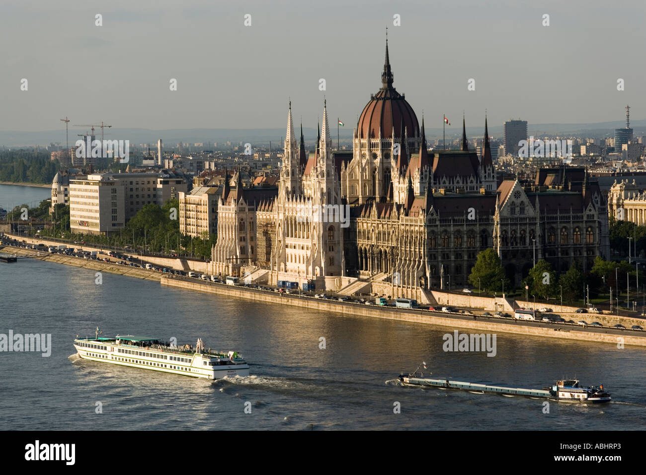 View over the Danube with boats to the Parliament Pest Budapest Hungary Stock Photo