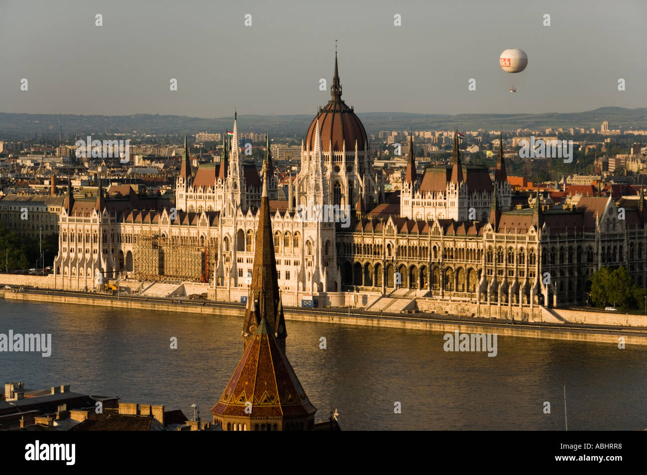 View to the Parliament and Budapest Eye balloon over the Danube river Pest Budapest Hungary Stock Photo