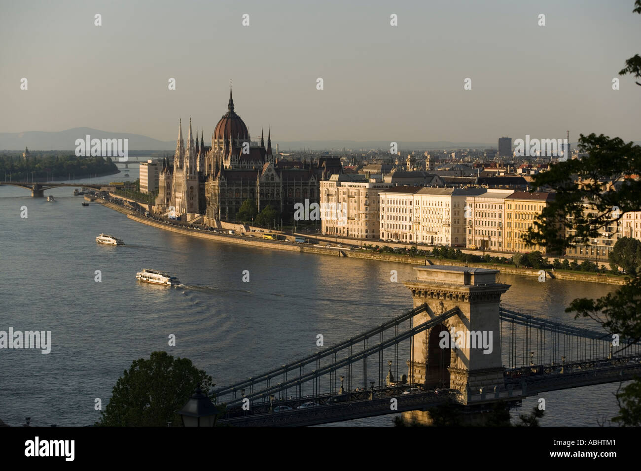 The Parliament Szechenyi Chain Bridge Leisure Boats on River Danube Pest Budapest Stock Photo