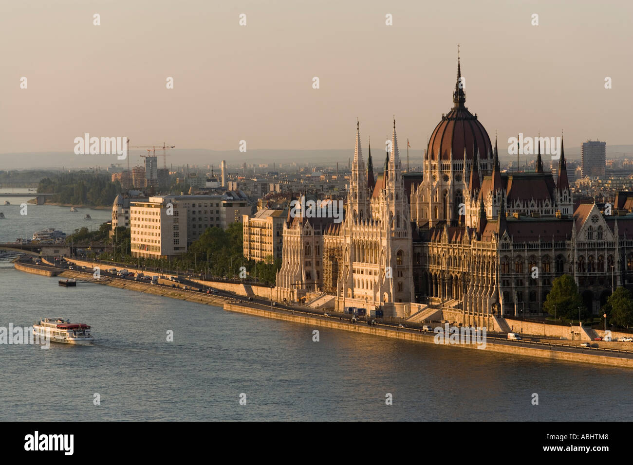 View over the Danube river with boats to the Parliament Pest Budapest Hungary Stock Photo