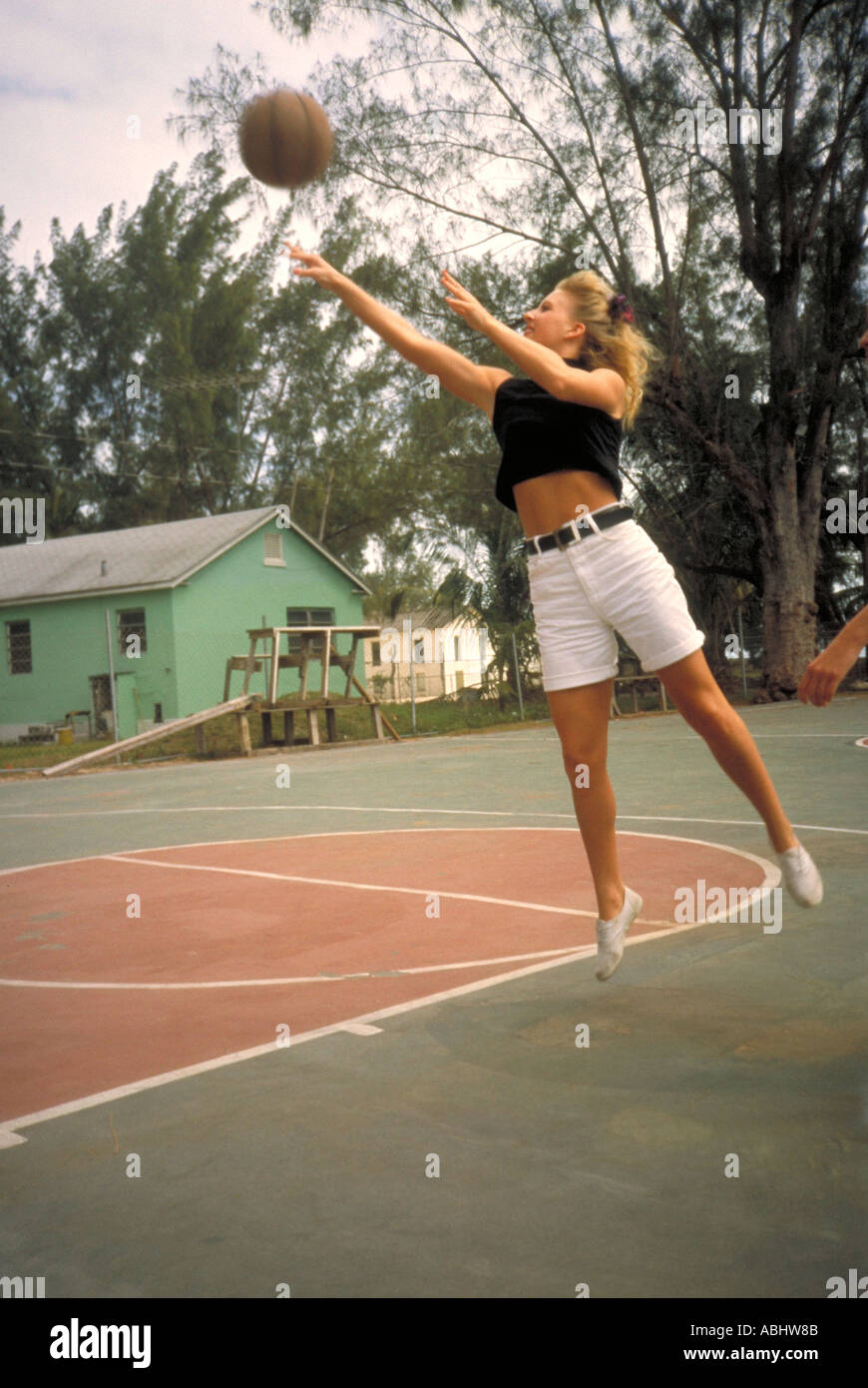 Teen girl shooting basketball St Paul Minnesota Stock Photo Alamy