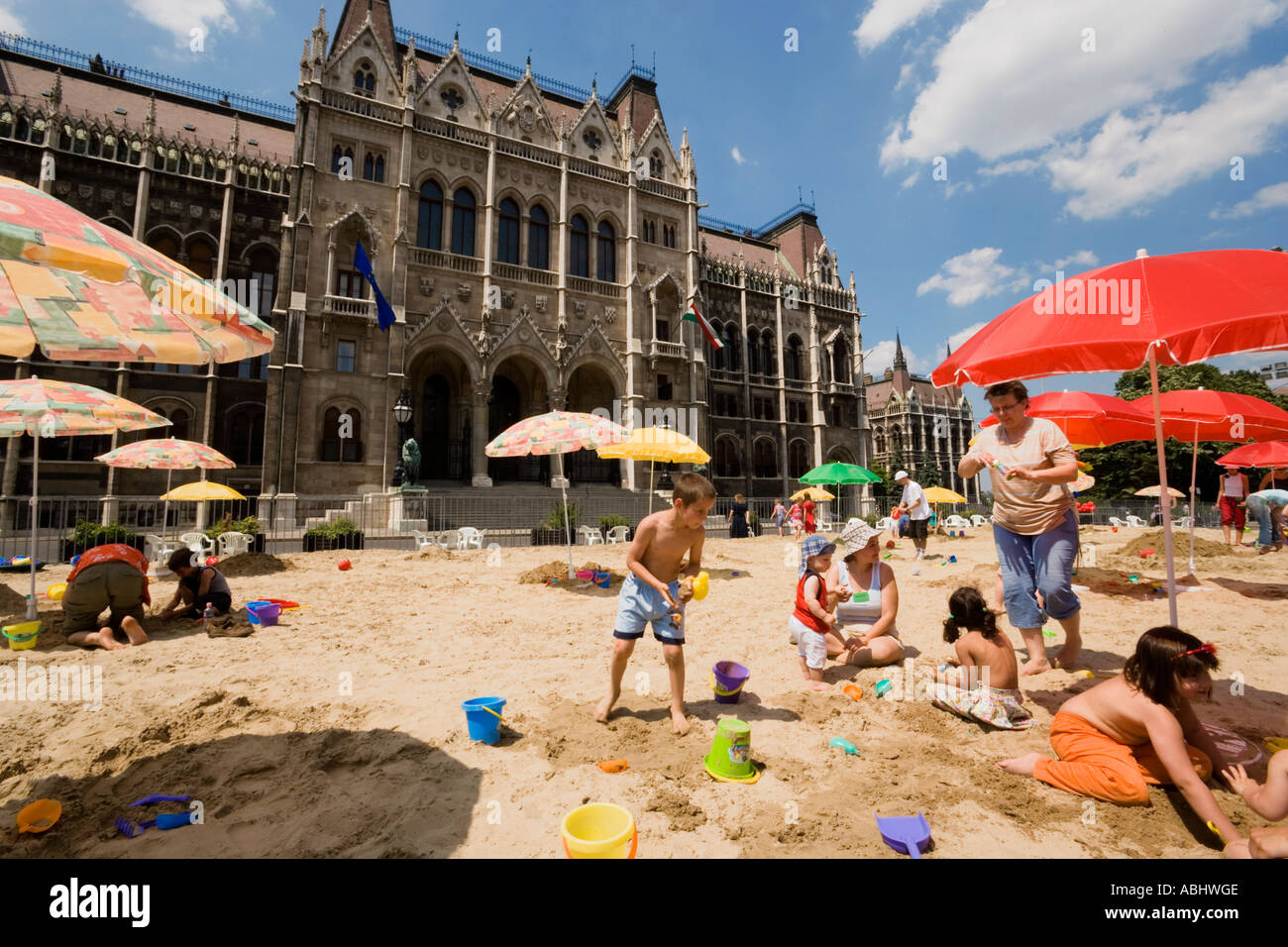 Children and parents playing at a temporary children s playground in the near of the parlaiment Pest Budapest Hungary Stock Photo