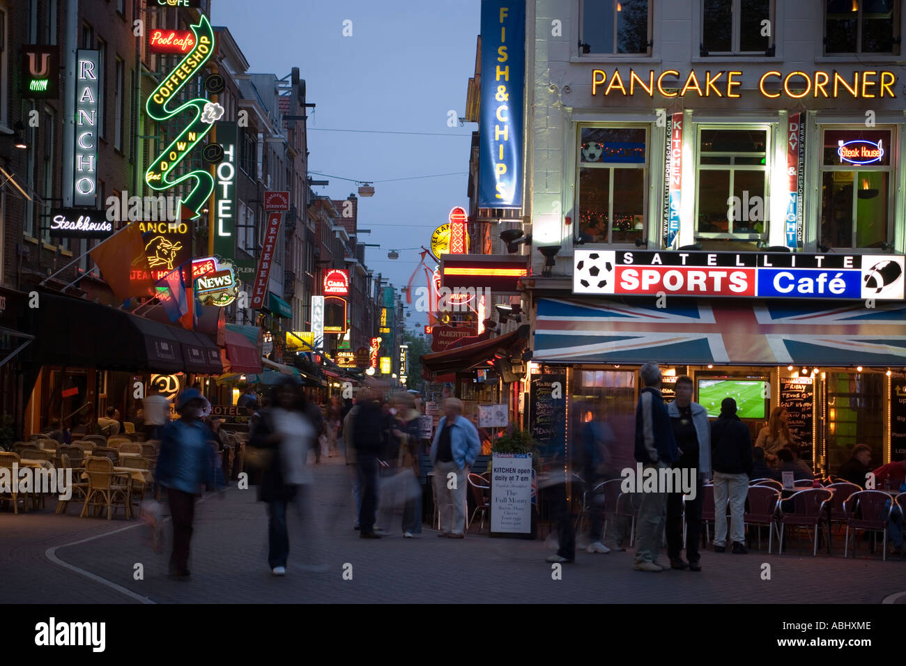 Restaurants and Bars in Leidseplein at a rainy day Amsterdam Holland