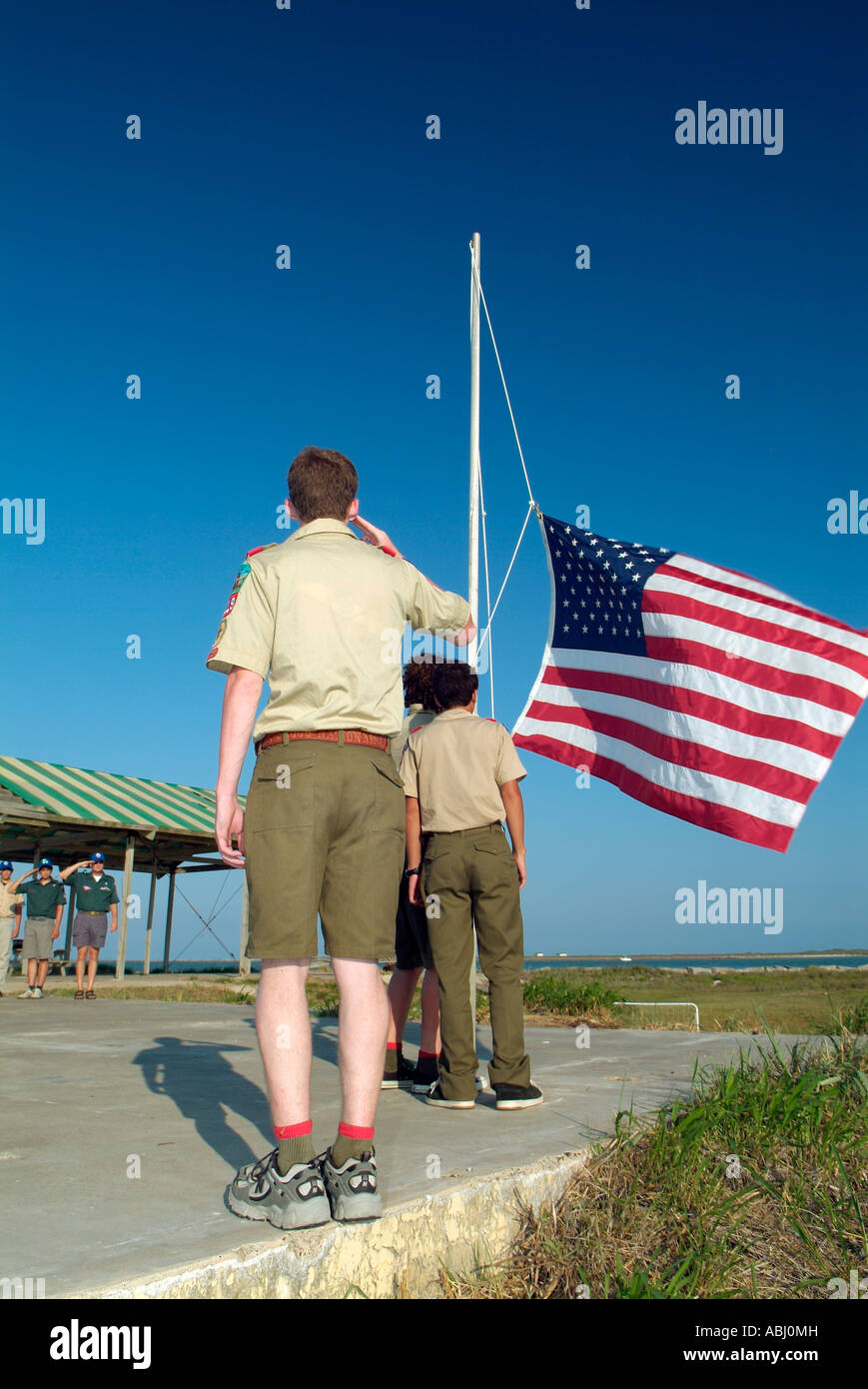 Boy scouts of America hoisting up the American flag Stock Photo Alamy