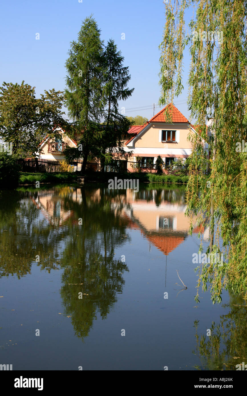 traditional single house on lake near Nepomuk, Czech Republic, Bohemia, Europe.  Photo by Willy Matheisl Stock Photo
