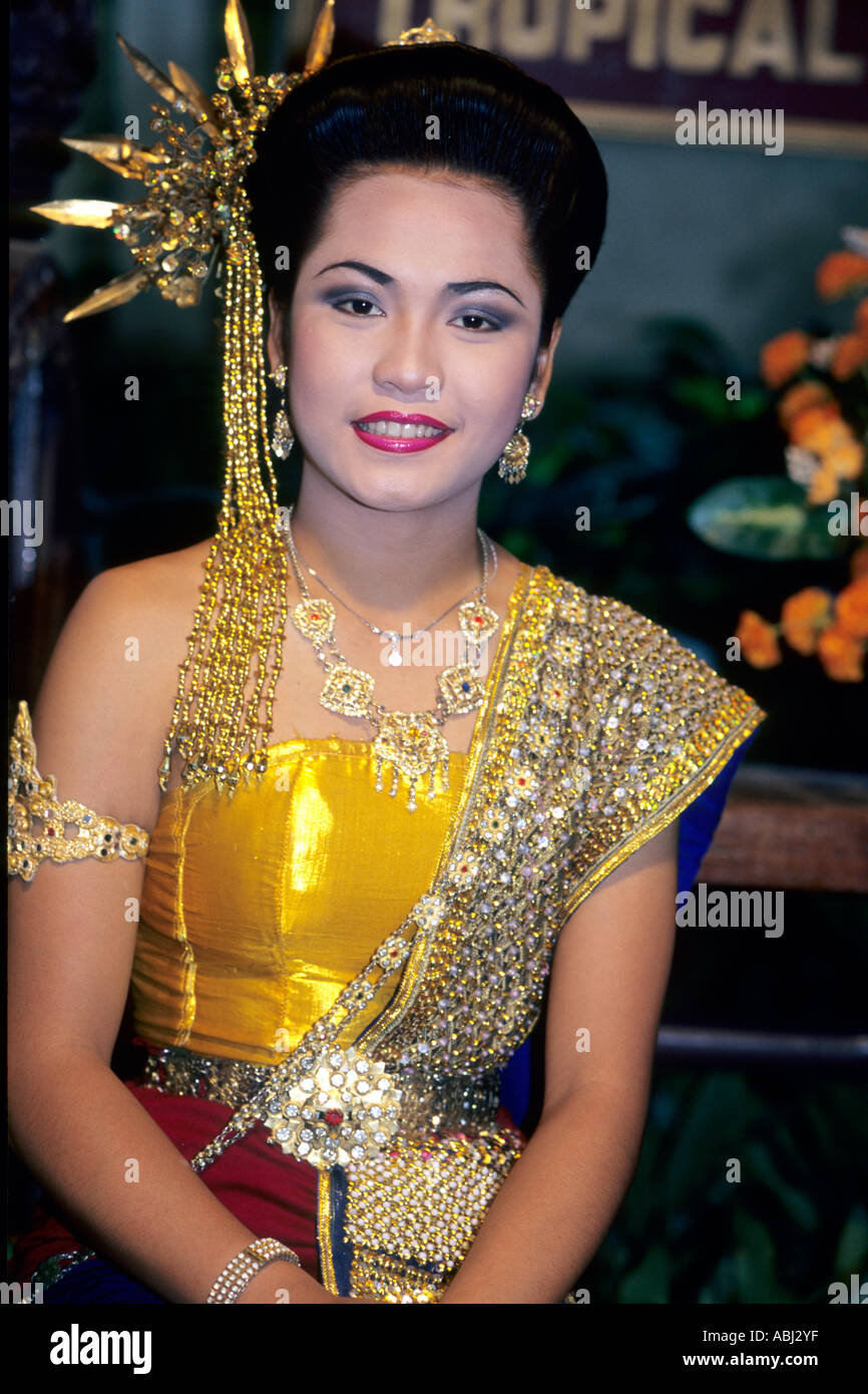 Lady in traditional Thai dress, Nong Nooch, Thailand Stock Photo - Alamy