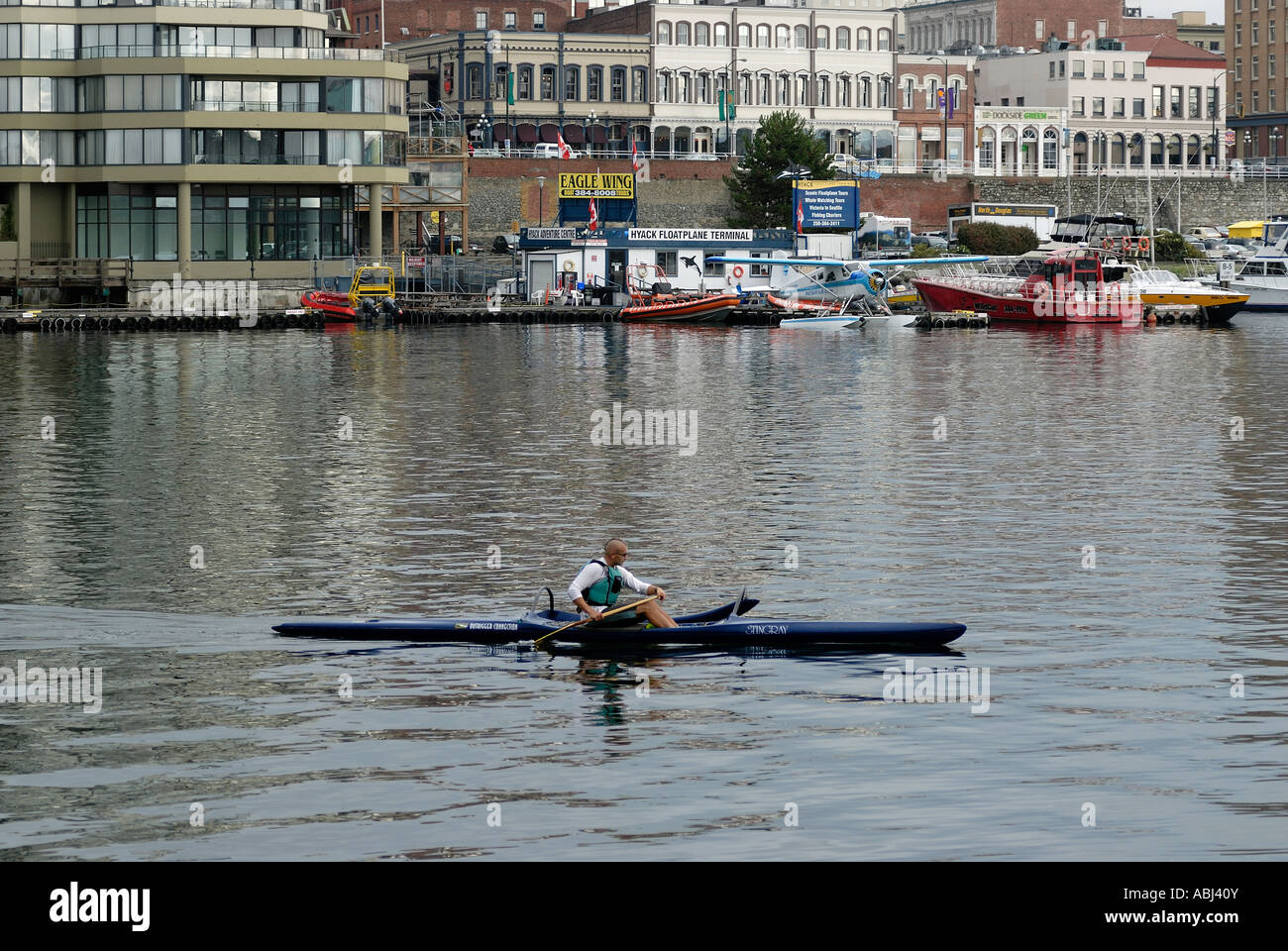 Man rowing in Victoria harbour, Vancouver Island Stock Photo - Alamy