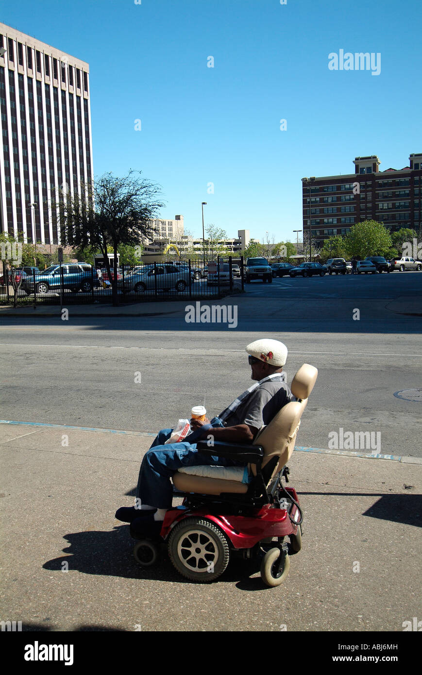 Handicapped man in wheelchair in Dallas downtown, Texas Stock Photo Alamy
