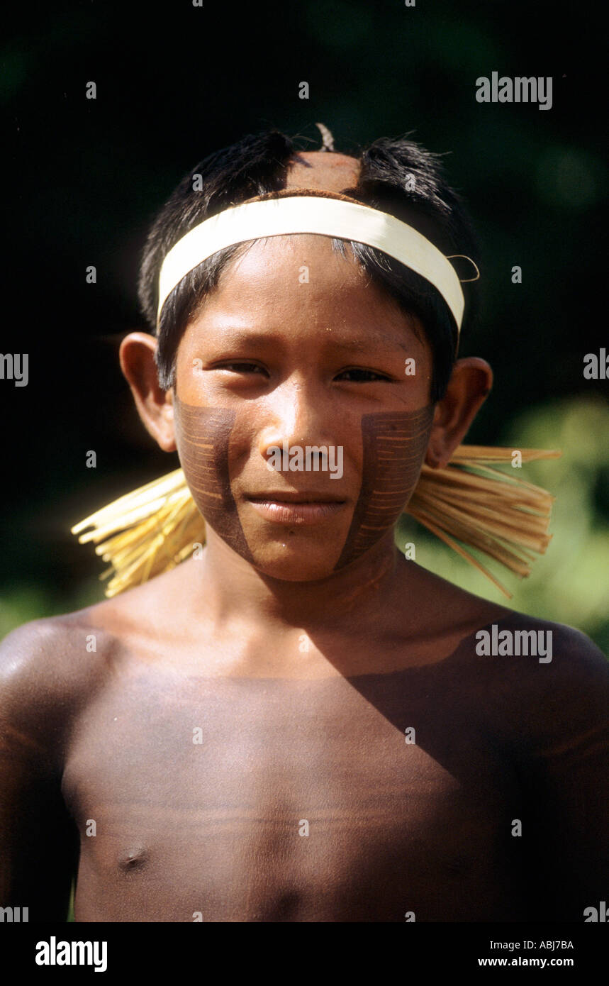 Bacaja village, Amazon, Brazil. A boy with a headband watches the hornets' nest initiation ceremony; Xicrin tribe. Stock Photo