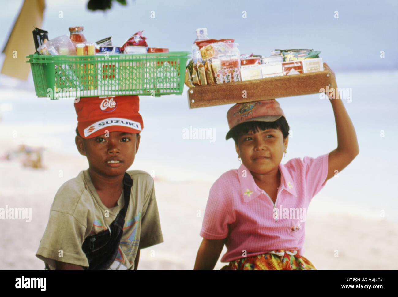 Child vendors on Samur beach Bali Stock Photo Alamy
