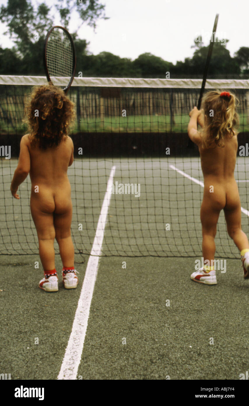 Naked twins playing tennis Stock Photo - Alamy