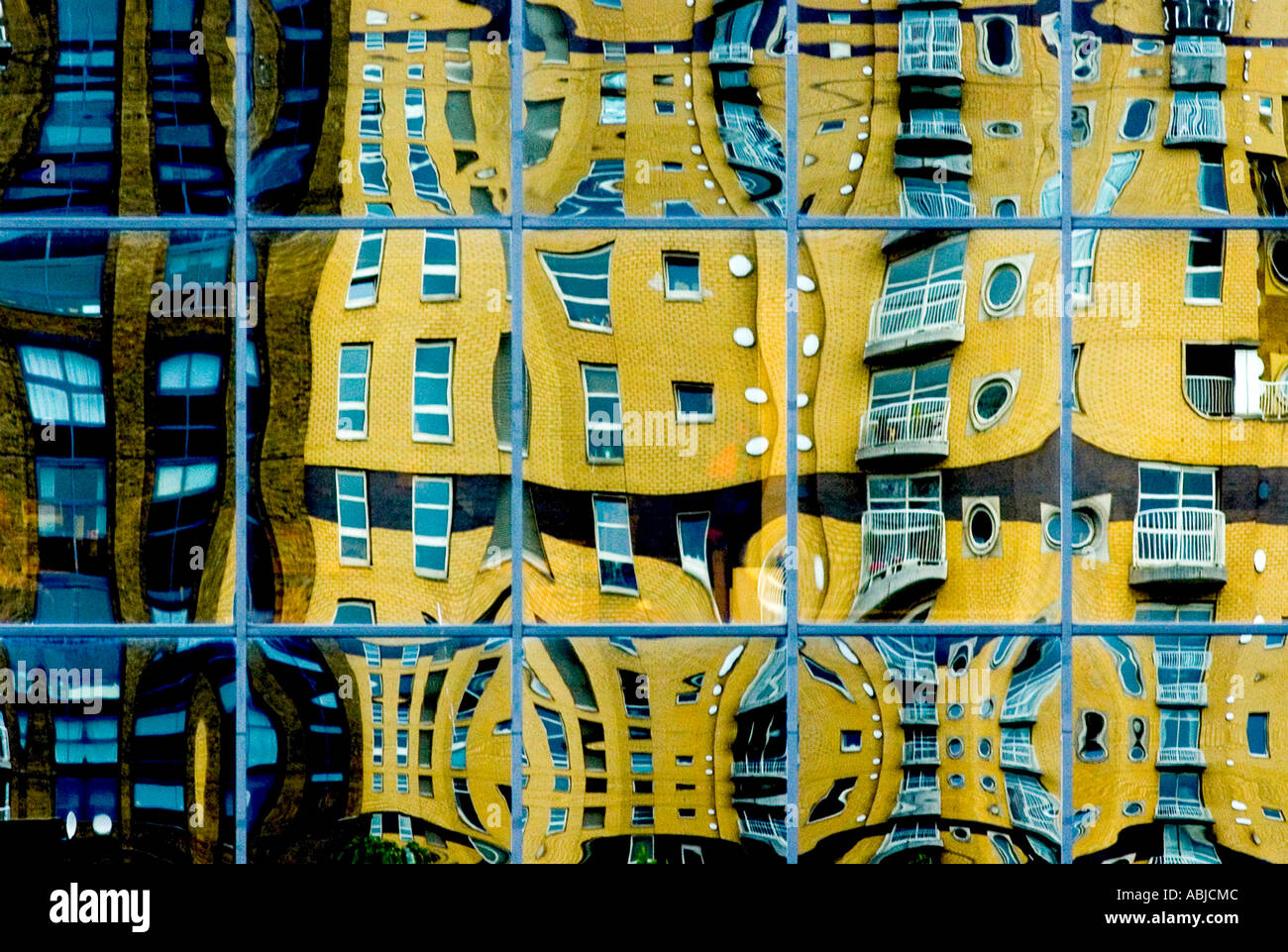 Distorted reflections of a building in Canary Wharf, London, England ...