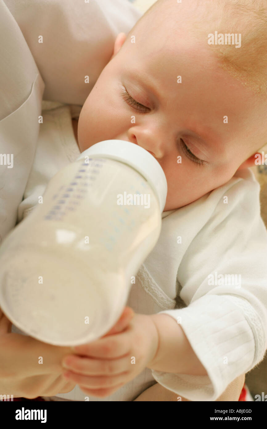 Baby being bottle fed Stock Photo Alamy