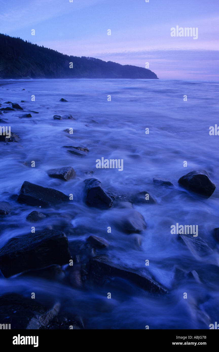 Twilight on the rocky beach at Cape Lookout State Park Oregon USA Stock Photo