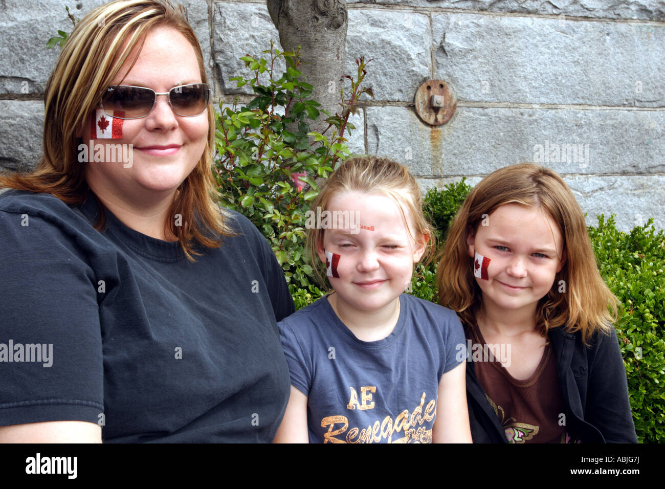 Portrait of a family in downtown Victoria during Canada Day celebration ...