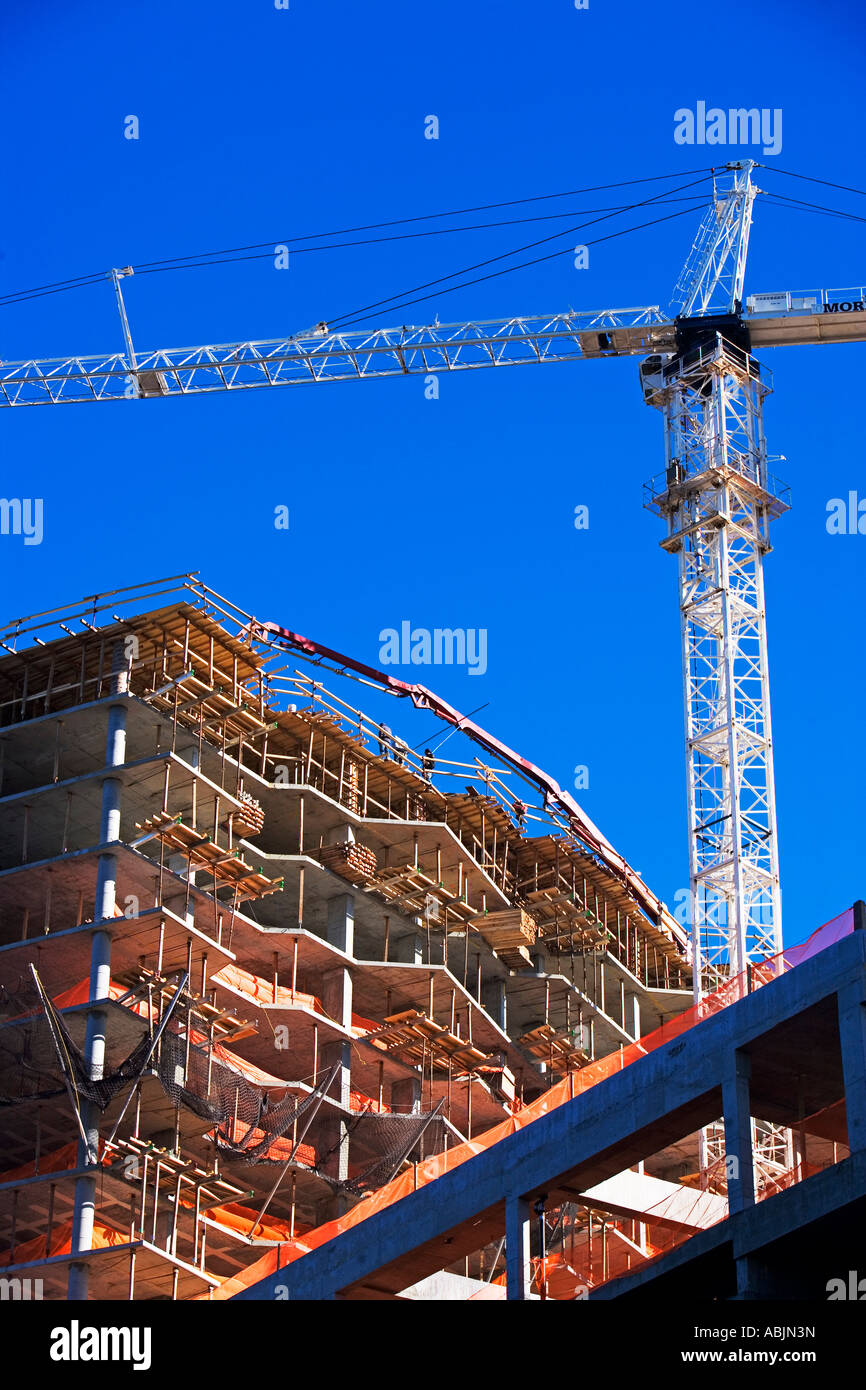 Low angle view of construction site and crane Stock Photo - Alamy