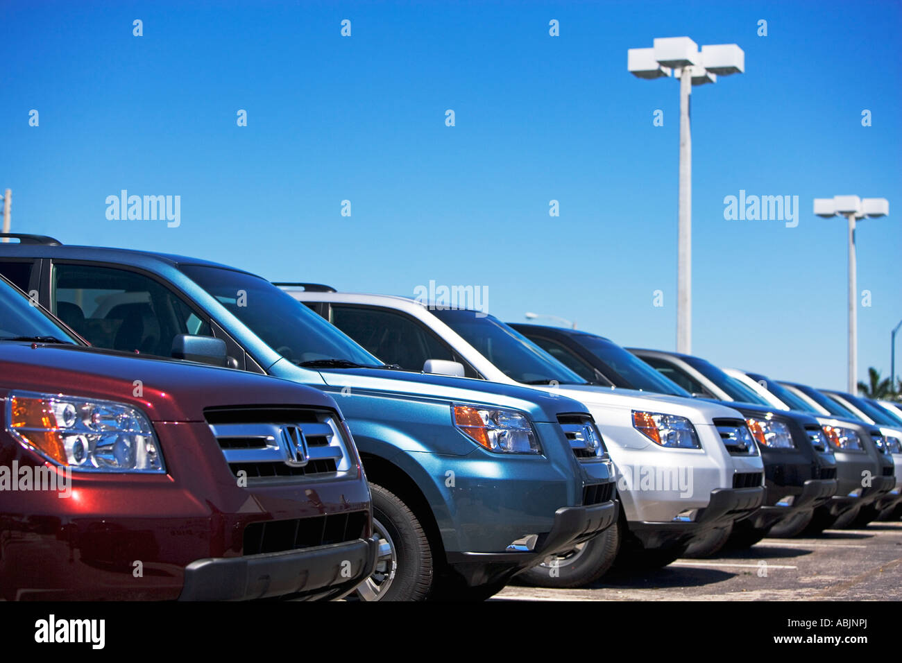 Row of new cars on lot Stock Photo