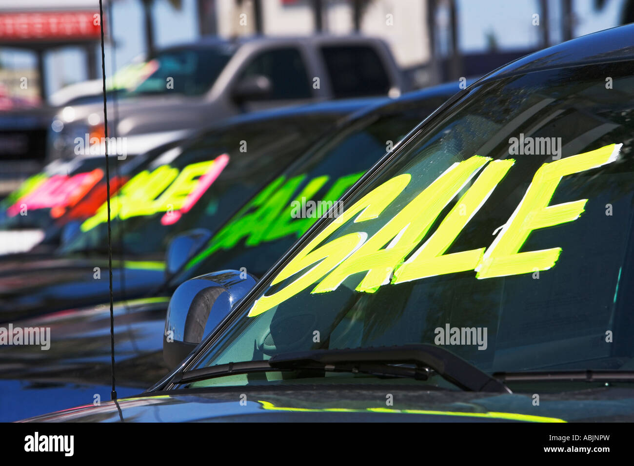 Cars with Sale on windshields Stock Photo Alamy