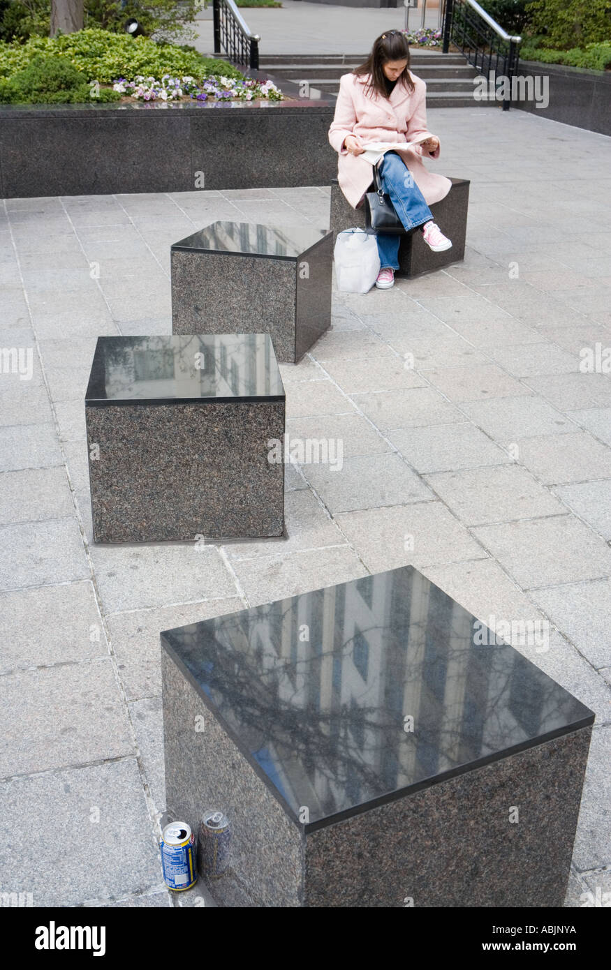 Girl and mirrored slabs Stock Photo