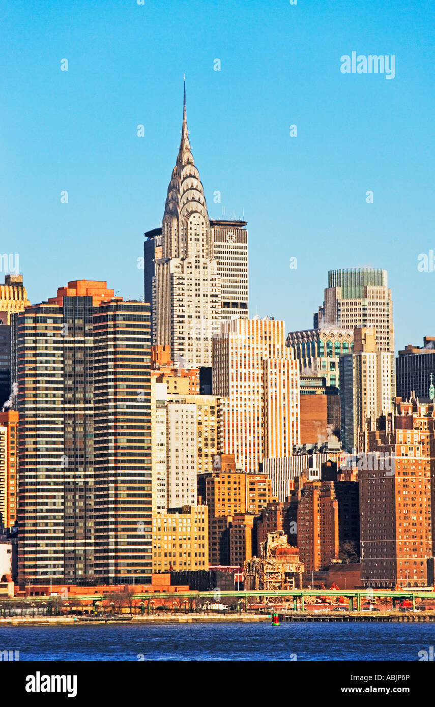 City skyline along water Stock Photo - Alamy