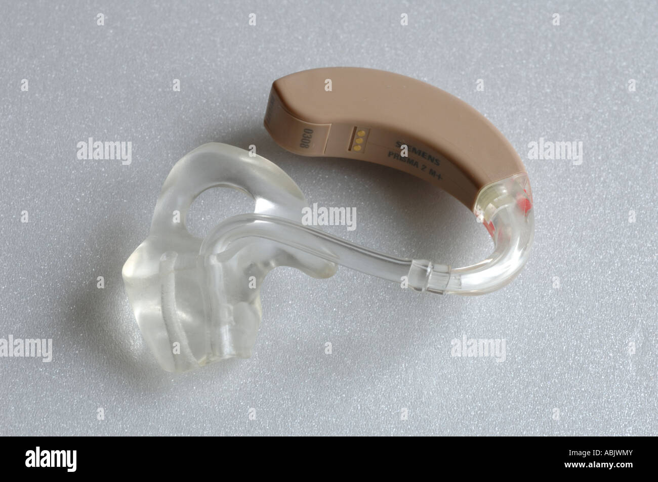 Siemens behind the ear hearing aid and ear mould Stock Photo - Alamy