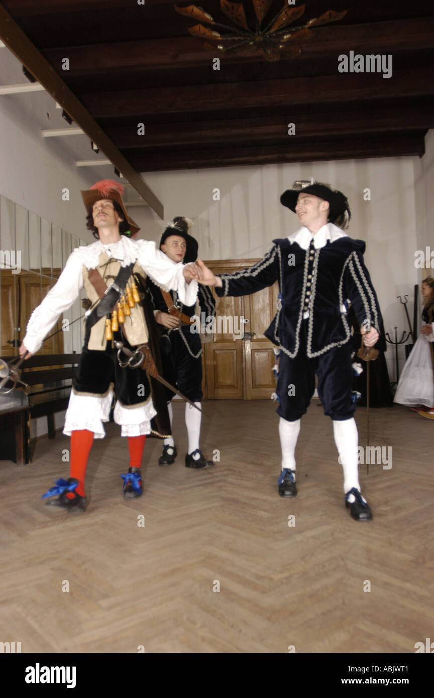 Spanish soldiers in old traditional dresses fighting inside old palace Sandomierz Poland Stock Photo