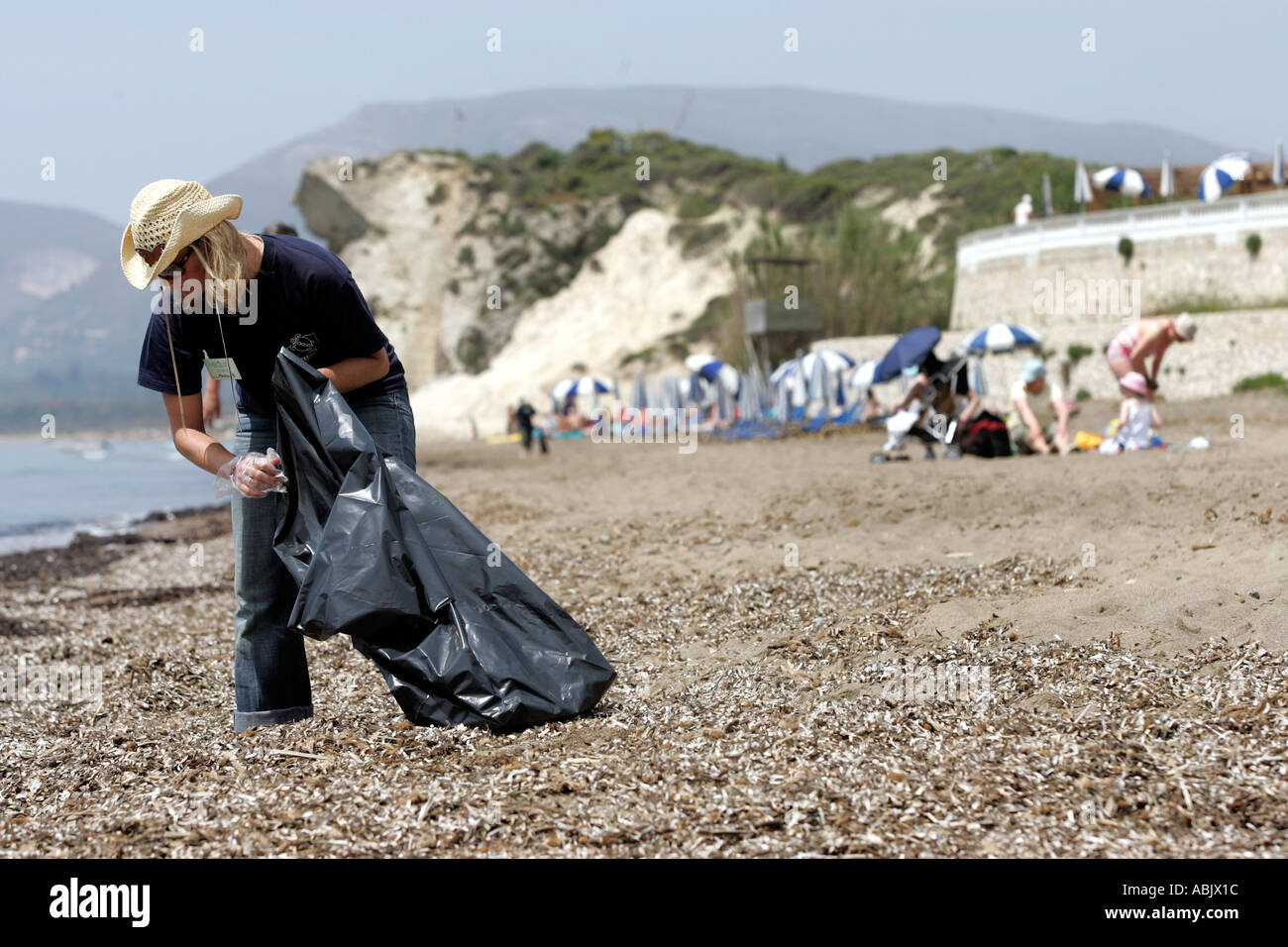 sea turtle protection society archelon members cleaning the beach of zakynthos Stock Photo
