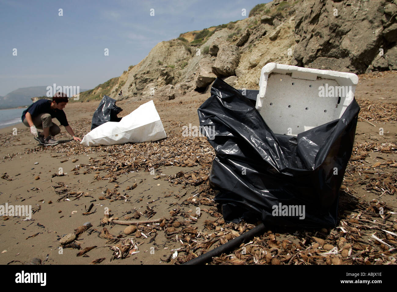 sea turtle protection society archelon members cleaning the beach of zakynthos Stock Photo