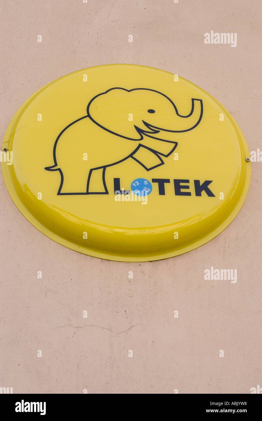 Yellow sign of Polish lotto lottery called Lotek with elephant as sign of  luck Poland Stock Photo - Alamy