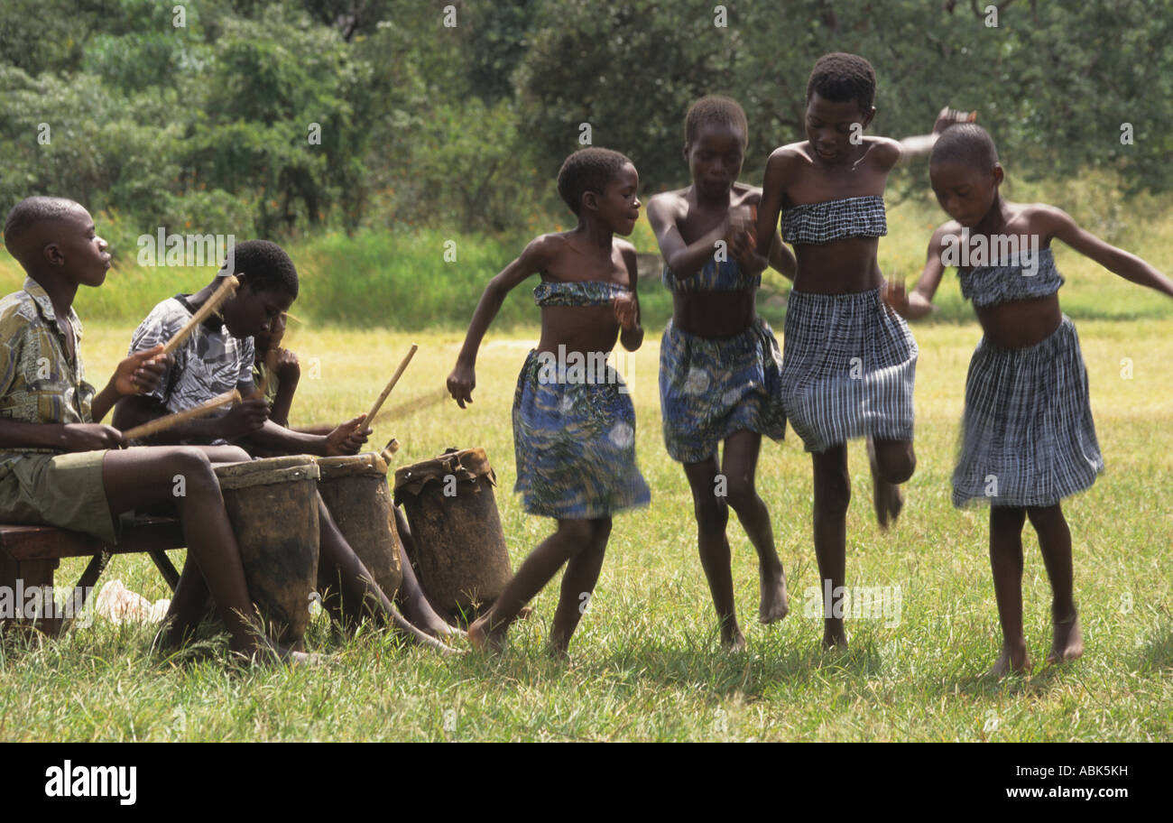 School children performing a traditional dance on tobacco farm, near Bindura, Zimbabwe, Southern Africa Stock Photo