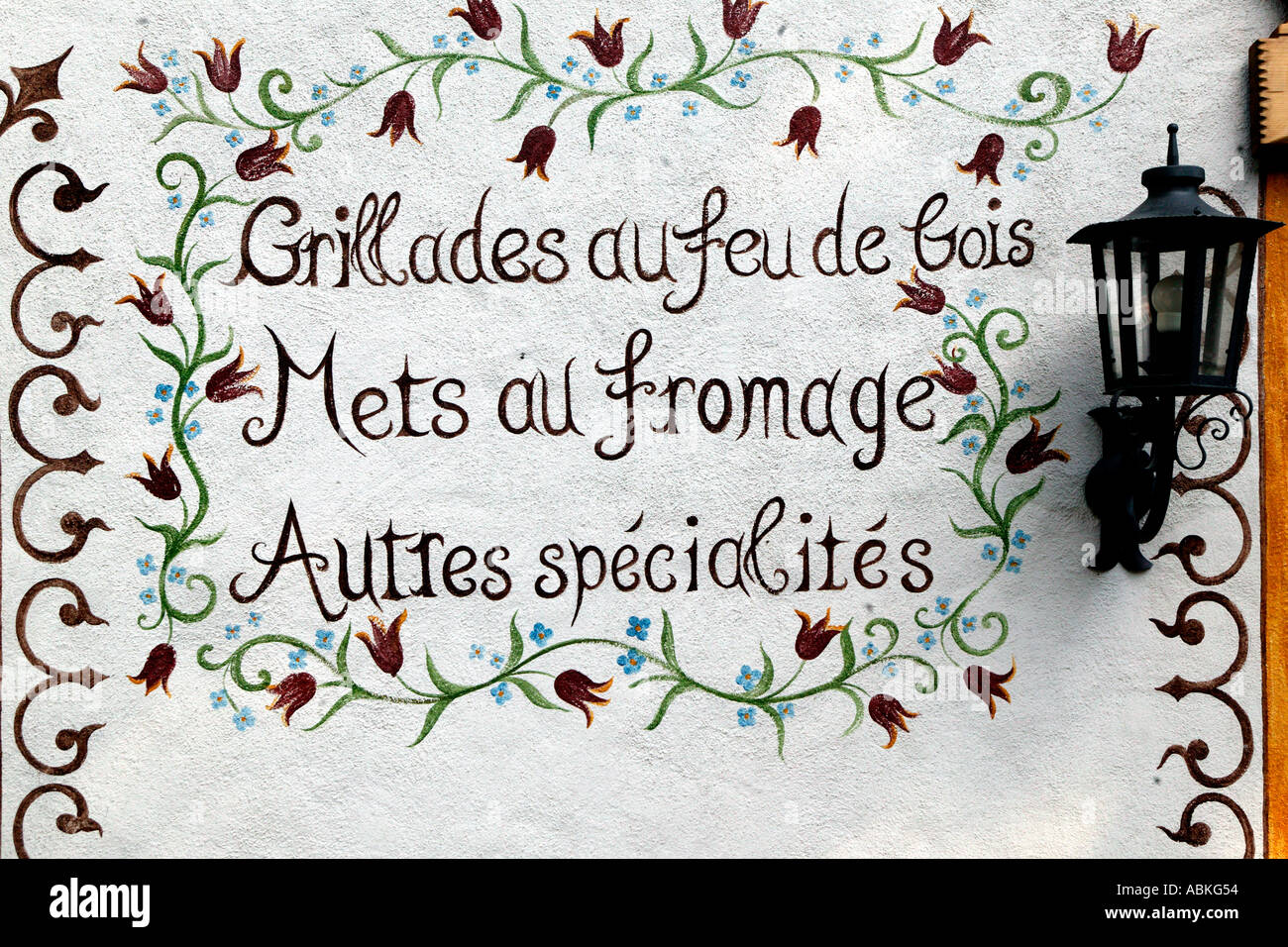 Restaurant menu sign selling local cheese specialities in Chateau d Oex ...