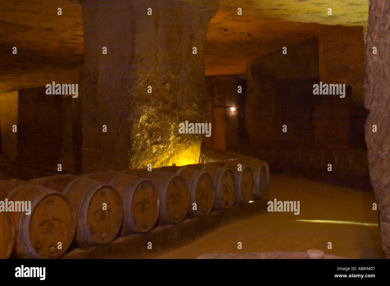 The underground winery and cellar in an old stone quarry, oak barrels