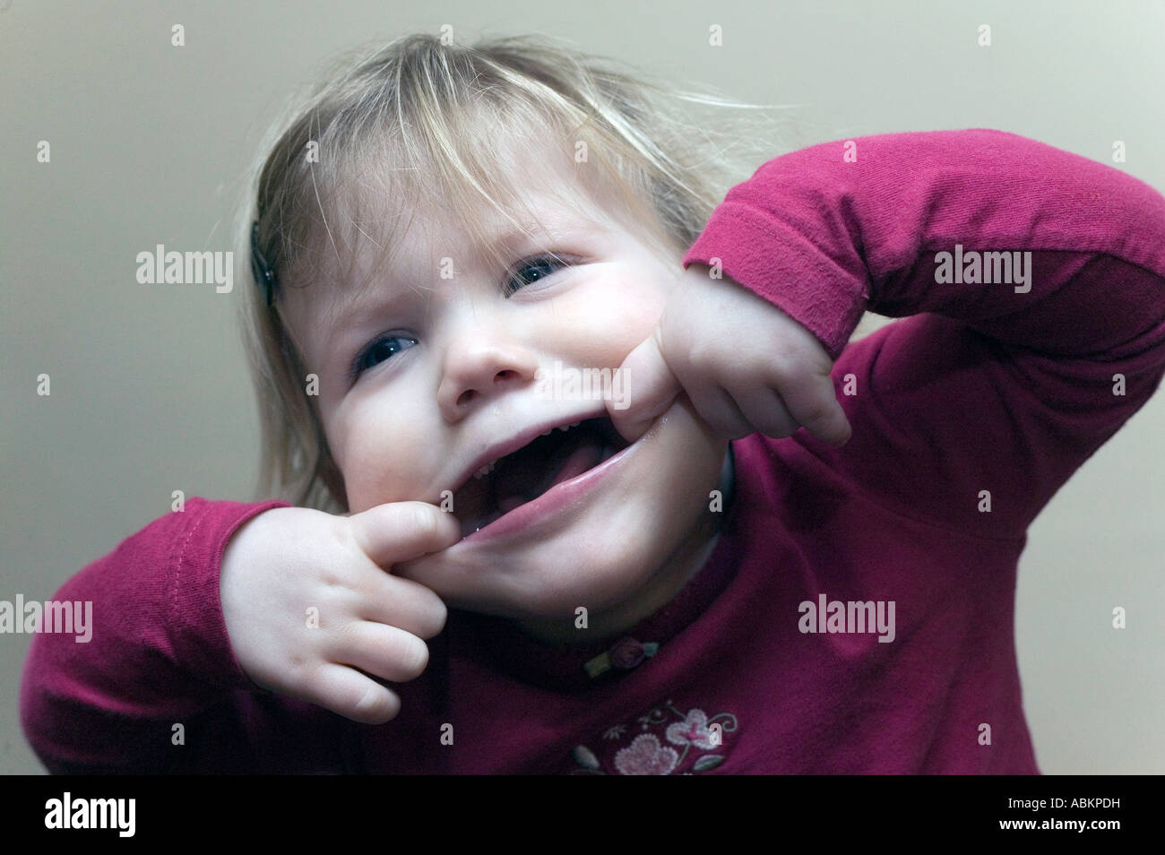 Girl pulling funny face Stock Photo Alamy