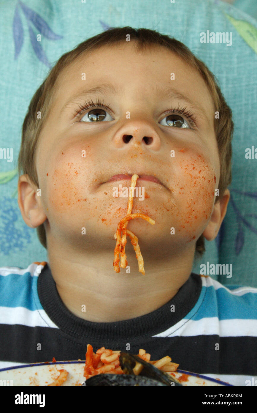 Boy Eating Spaghetti Stock Photo Alamy